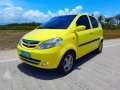 Yellow car Chana Benni 2008 model year 13 L gas Manual Local-5