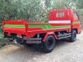Isuzu elf 10 feet dropside double tire-3