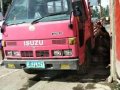 Fresh Isuzu Elf 2010 Red MT For Sale-1