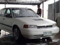 Mazda 323 1996 MT White For Sale-0