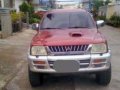 Mitsubishi Strada 2002 Red Manual -1