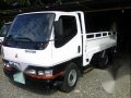 For sale Dropside Mitsubishi trucks -1