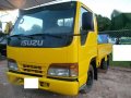 Isuzu Elf and Toyota Dropside-0