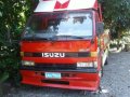 Isuzu elf 4bg1 at 14ft-0