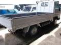 Isuzu Elf and Toyota Dropside-5