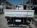 isuzu elf nkr dropside-8