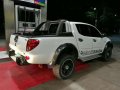 2008 Mitsubishi Strada 4x4 White MT-6