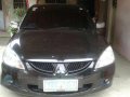 Mitsubishi Lancer 2004 Black AT -0