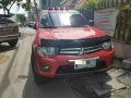 2012 Mitsubishi Strada Glx V Red AT-8