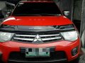 2012 Mitsubishi Strada Glx V Red AT-5