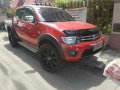 2012 Mitsubishi Strada Glx V Red AT-4