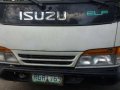 isuzu elf giga 16ft close van-1