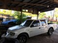 isuzu Fuego 2004 White MT For Sale-0