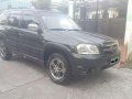 Mazda Tribute SUV 2005 AT Black -0