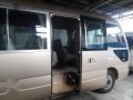 2013 Toyota Coaster Gliding Door Dubai Version (Beige)-1