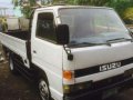 isuzu Elf dropside 10ft 4hf1 6whlr-1