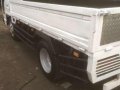 isuzu Elf dropside 10ft 4hf1 6whlr-3