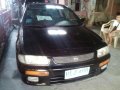 Kia carnival mazda familia rayban-6