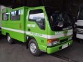 isuzu elf giga nkr fb body water tanker truck japan surplus-6