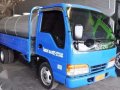 isuzu elf giga nkr fb body water tanker truck japan surplus-11