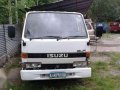 Isuzu Elf Mini Dump eagle in line-4