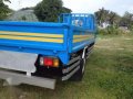 Isuzu elf nkr Dropside 14ft 4be1-0