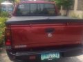 Nissan Frontier Bravado Pick Up Red MT-1