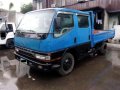 isuzu elf dropside 4be1 inline nkr 14ft Truck-7