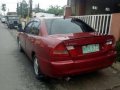 Mitsubishi Lancer GLXI 1998 Red MT -5