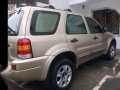 Brown Ford Escape 2004 automatic 2.0 liters 4x2-0