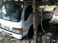 Isuzu Elf 4bc2 12ft White MT For Sale-0