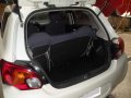 Mirage Hatchback GLX 2013 White-3