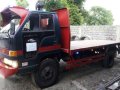 Isuzu Elf 150 14 Ft Red MT For Sale-1