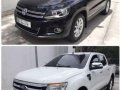 (2015 Ford Ranger XLT4x2 AT)and (2014 Volkswagen Tiguan 2.0 AT DIESEL)-0