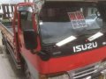 isuzu elf dropside 4hf1 14ft aircon-1