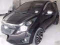 Chevrolet Spark 2012. Top of the Line. Automatic. Black. P328T-0