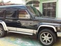 1997 Nissan Patrol Safari GQ Black 4x4 MT-4