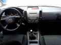 2009 Mazda BT-50 528t Nego (Kotsemar) vs Navara Strada-11