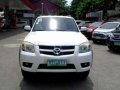 2009 Mazda BT-50 528t Nego (Kotsemar) vs Navara Strada-1