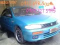 Metallic Blue Mazda Familia 323 96 Mdl-0