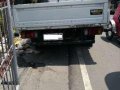 Isuzu Elf Dropside 1994 MT White For Sale-0