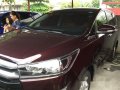 Toyota Innova 2017 brown van for sale -3