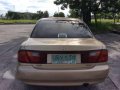 97 Mazda familia 323 rayban matic-1