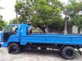 Isuzu Elf Dropside-3