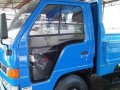 Isuzu Elf Dropside-1