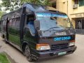 Isuzu Elf Minibus 4HF-1 Black MT For Sale-1