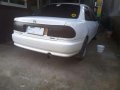 Mazda 323 1999 (seagull emblem)-2