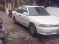 Mitsubishi Lancer Glxi 1993 White MT -9