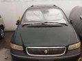 Chrysler Town and Country Lxi 1997 Green AT -6