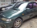 1997 Mazda 323 Familia GLXi Green MT -5